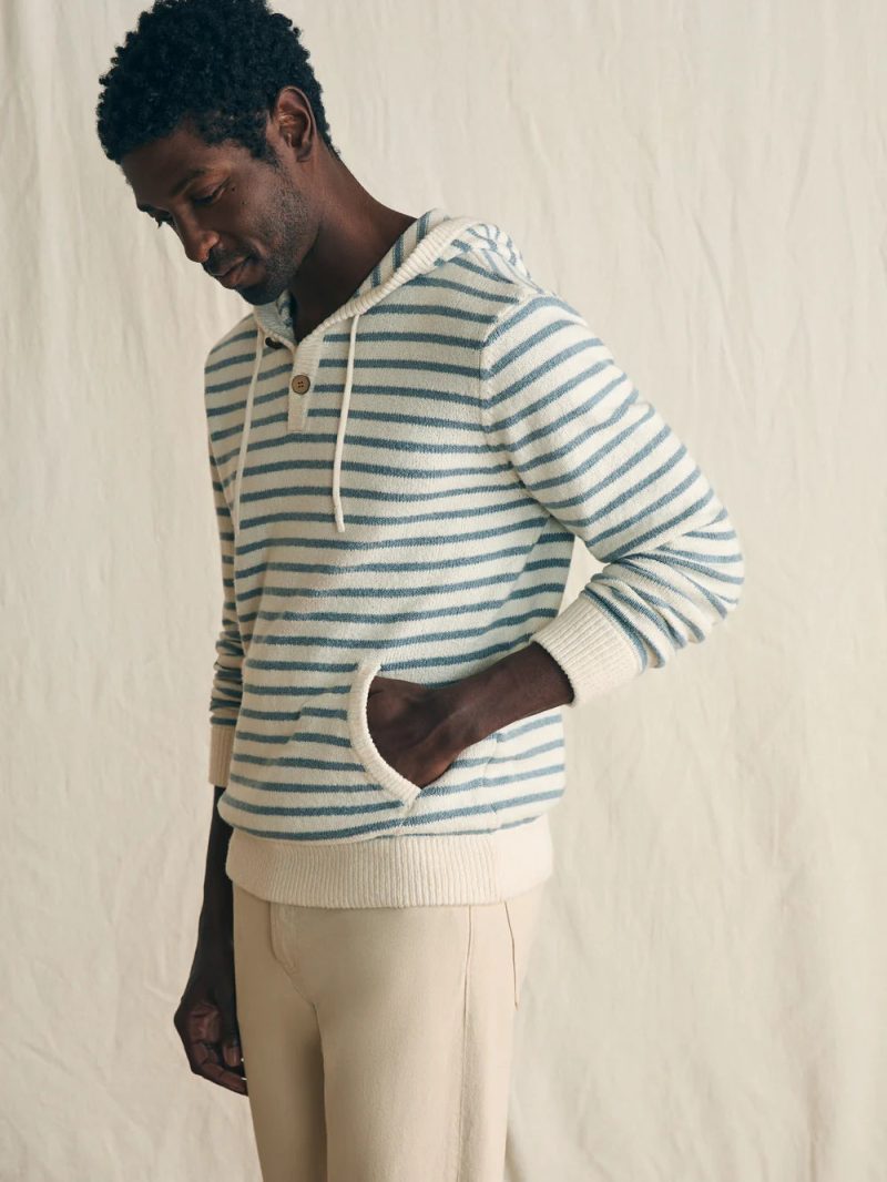 FAH1035 SU24 faherty MYU2406 ICH cove sweater hoodie ivory chambray stripe OM EDITORIAL 1 1000x d9205d76 f08b 49d1 a90e e21b70a33420